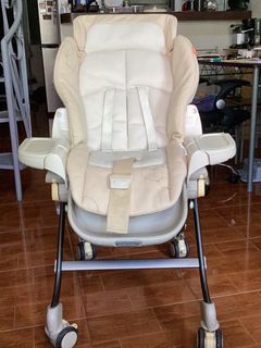 Combi Baby rocker/hi-chair/sleeper/seater