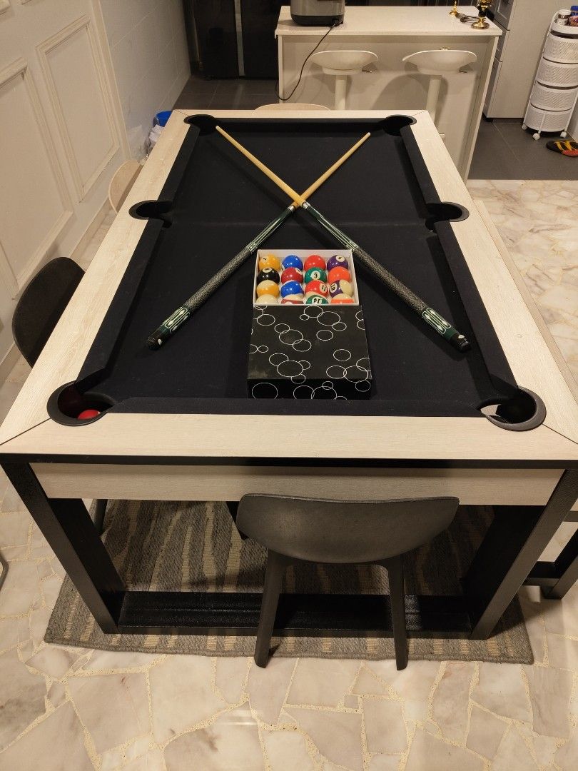 Dining pool table (Category: Tables & Sets) located in Singapore. Submitted by miokecik (Listing ID 1273113228, Image 3). Description: 6ft Dining pool table Dimension: Table length: 189cm Table Width: 110cm Table Height: 82cm Table Weight : 148kg Include: 4 chairs and 1 bench 2 pcs cue sticks 2 set pool balls 1 triangle rack 1 pcs brush 2 pcs chalk self pick up at 761 woodlands ave 6 and arrange your own transport.