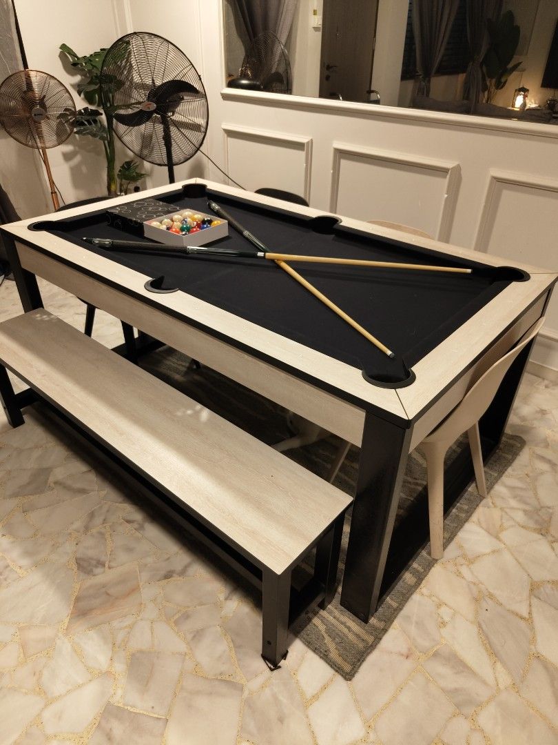 Dining pool table (Category: Tables & Sets) located in Singapore. Submitted by miokecik (Listing ID 1273113228, Image 1). Description: 6ft Dining pool table Dimension: Table length: 189cm Table Width: 110cm Table Height: 82cm Table Weight : 148kg Include: 4 chairs and 1 bench 2 pcs cue sticks 2 set pool balls 1 triangle rack 1 pcs brush 2 pcs chalk self pick up at 761 woodlands ave 6 and arrange your own transport.