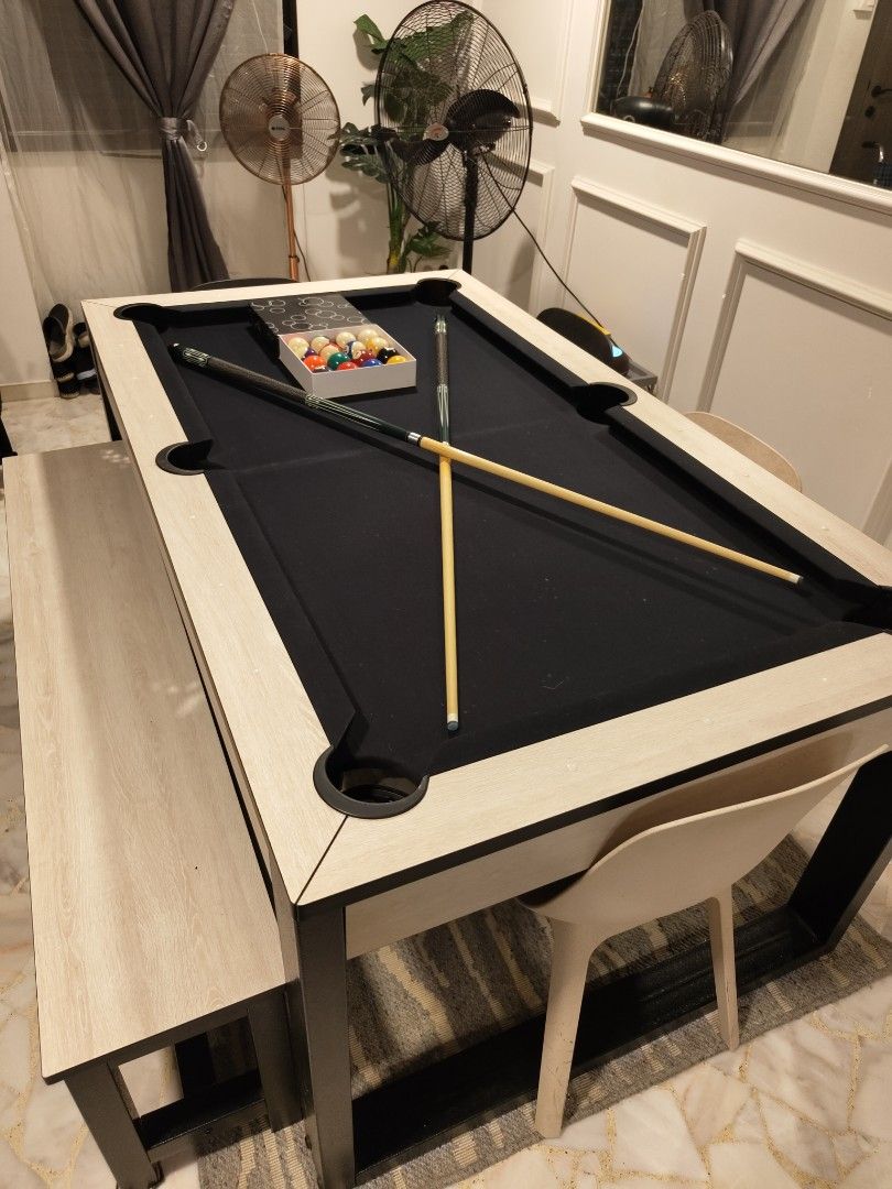 Dining pool table (Category: Tables & Sets) located in Singapore. Submitted by miokecik (Listing ID 1273113228, Image 2). Description: 6ft Dining pool table Dimension: Table length: 189cm Table Width: 110cm Table Height: 82cm Table Weight : 148kg Include: 4 chairs and 1 bench 2 pcs cue sticks 2 set pool balls 1 triangle rack 1 pcs brush 2 pcs chalk self pick up at 761 woodlands ave 6 and arrange your own transport.