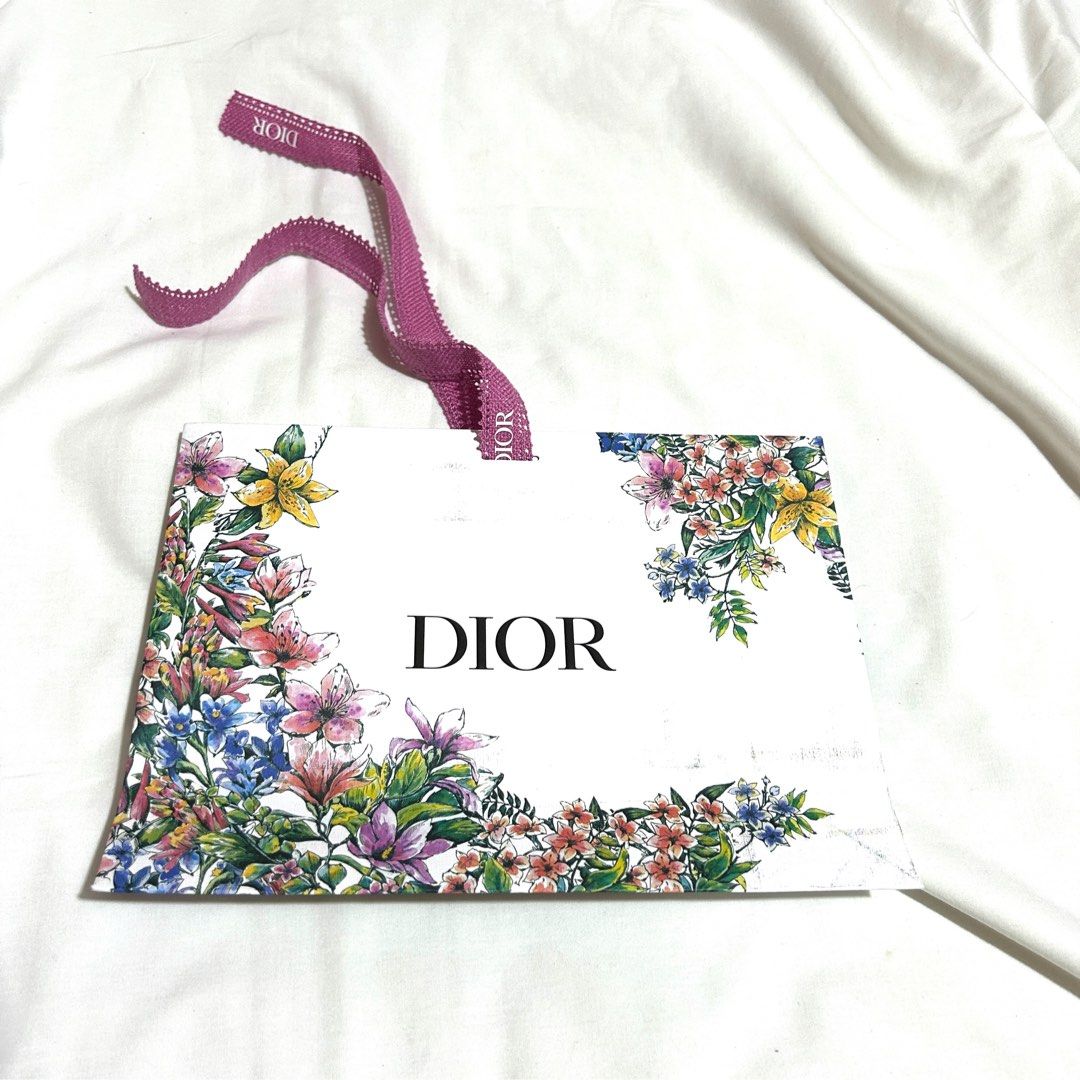Dior Small Paper Bag with ribbon (Category: Luxury Bags & Wallets) located in Caloocan City. Submitted by pasabuybytinedahan (Listing ID 1272947277, Image 2). Description: with dirt on one side, see second picture.