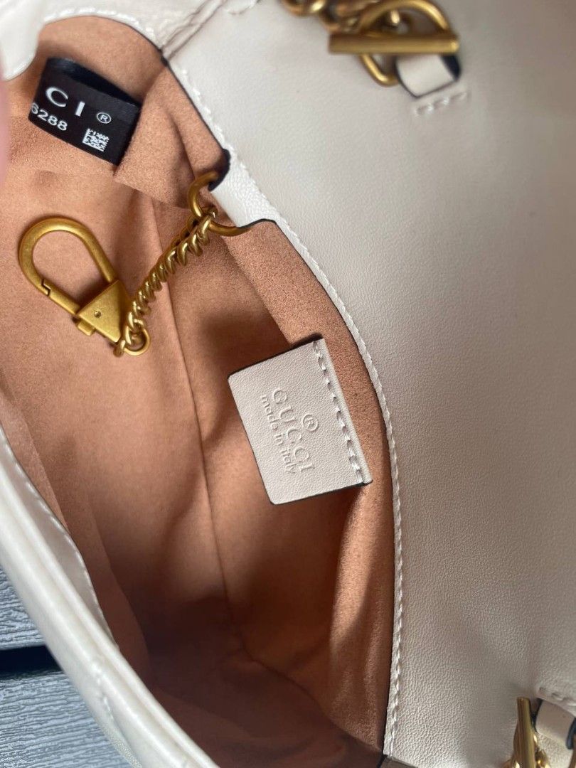 Gucci zipper 2025 tag