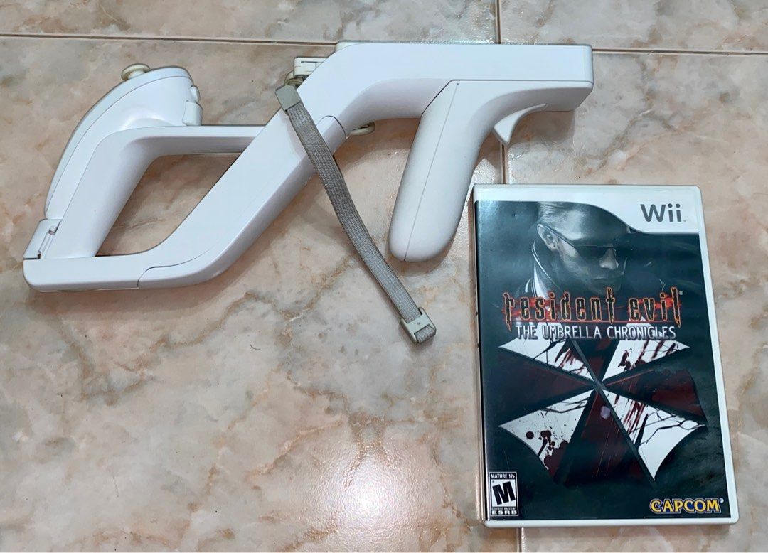 Nintendo Wii Zapper with Wiimote Nunchuck and Resident evil