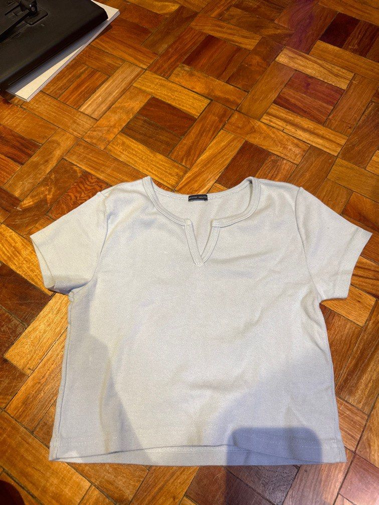 Brandy Melville Blue Cropped Shirt (Category: Shirts) located in Pasig City. Submitted by soph__ (Listing ID 1273288168, Image 1). Description: No ww No measurements Fits xs-S free size.
