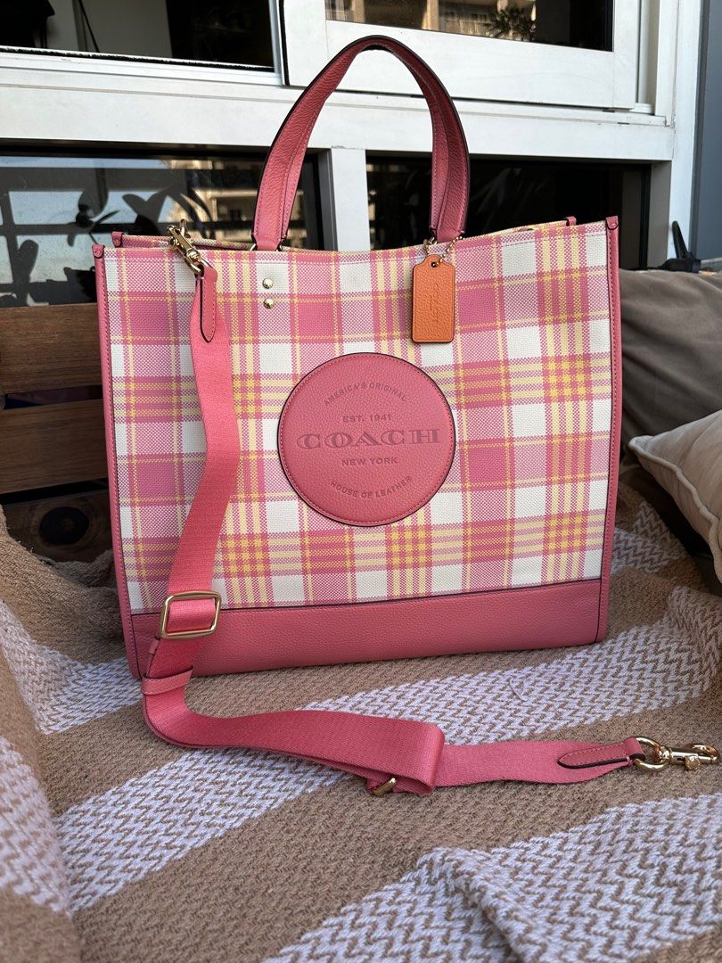 Coach Dempsey 40 Pink (Category: Luxury Bags & Wallets) located in Pasig City. Submitted by jackie_ginger (Listing ID 1166677101, Image 1). Description: Onhand with tag and care card 💯orig.