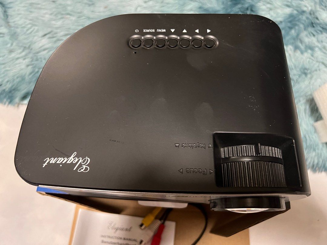 LED projector 1080p HD (Category: Projectors) located in Calamba. Submitted by proxima79 (Listing ID 1273391566, Image 2). Description: LED PROJECTOR ELEGIANT brand 720p/1080p Full HD scale HDMI /VGA input audio out routing for speakers USB direct interface play media files thru USB item is barely used no hidden defect very bright display vivid color enjoy cenimatic screen experience at the comfort of your home complete package box and accessorie