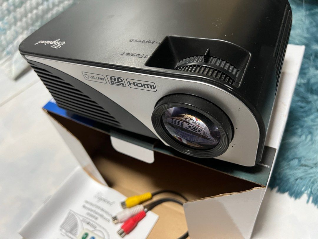 LED projector 1080p HD (Category: Projectors) located in Calamba. Submitted by proxima79 (Listing ID 1273391566, Image 3). Description: LED PROJECTOR ELEGIANT brand 720p/1080p Full HD scale HDMI /VGA input audio out routing for speakers USB direct interface play media files thru USB item is barely used no hidden defect very bright display vivid color enjoy cenimatic screen experience at the comfort of your home complete package box and accessorie