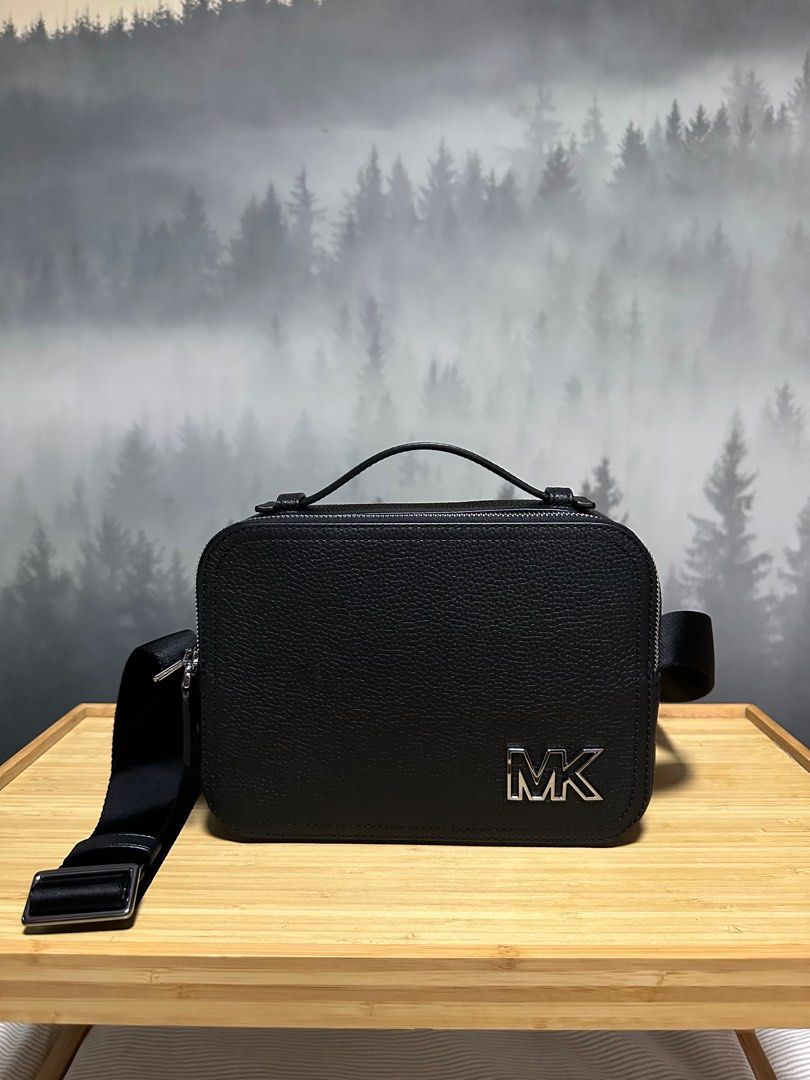 Mk cooper map bag (Category: Luxury Bags & Wallets) located in Pasig City. Submitted by jackie_ginger (Listing ID 1242902354, Image 2). Description: Onhand with tag and care card 💯 original from US 🅰️vailable colors Black , navy (blue), brown.