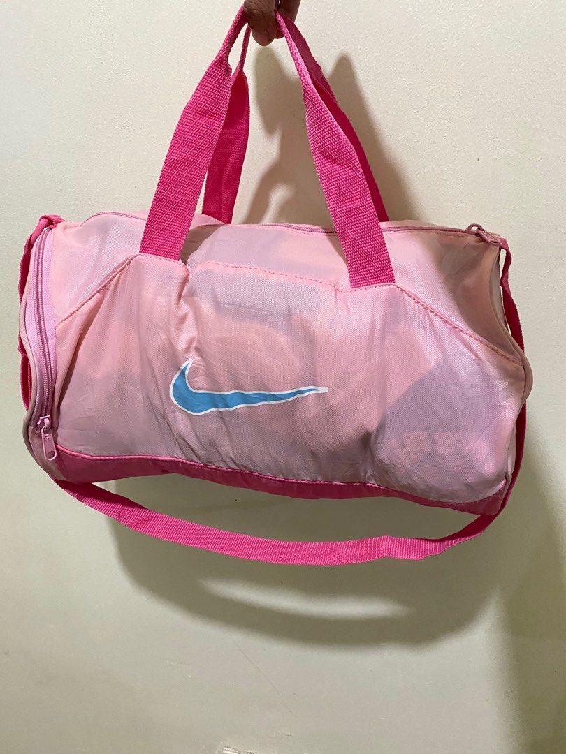Pink nike duffle bag best sale