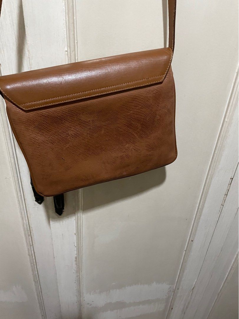 Shoulder/cross body bag (Category: Luxury Bags & Wallets) located in Quezon City. Submitted by deadmit (Listing ID 1270660902, Image 3). Description: Has minor flaws as shown in pics Very spacious, 3 compartments.