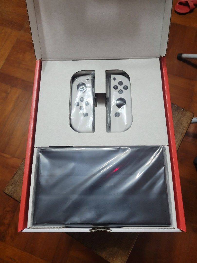 Switch OLED （分類：Nintendo 任天堂）位於 Hong Kong。 由 xkit97 提交（商品編號 1273379244，圖片 2）。簡介： 全新 MoneyHero 信用卡禮品。