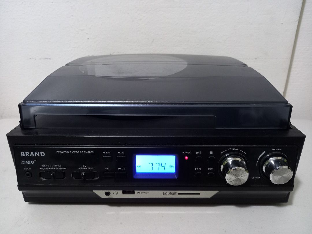 Looptone 3-in-1 Record Player & Radio (Category: Other Audio Equipment) located in Quezon City. Submitted by mb.tan (Listing ID 1273418861, Image 1). Description: - Looptone 3-in-1 Record Player & Radio - Turntable is belt-driven, has a 3 speed function (33rpm, 45rpm, 78rpm), and an auto stop feature. - Side-loading cassette player. - AM/FM radio. - USB and SD card slot. - Comes with dust cover..