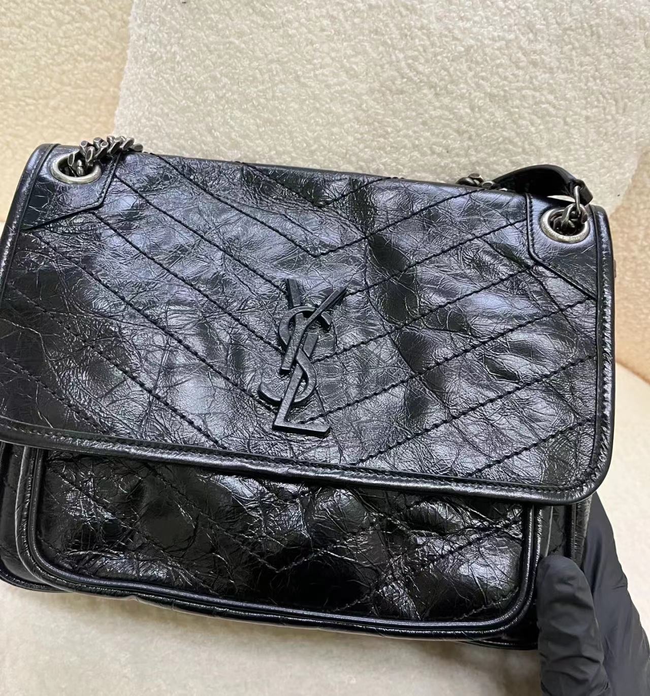 Medium niki monogram leather sales bag