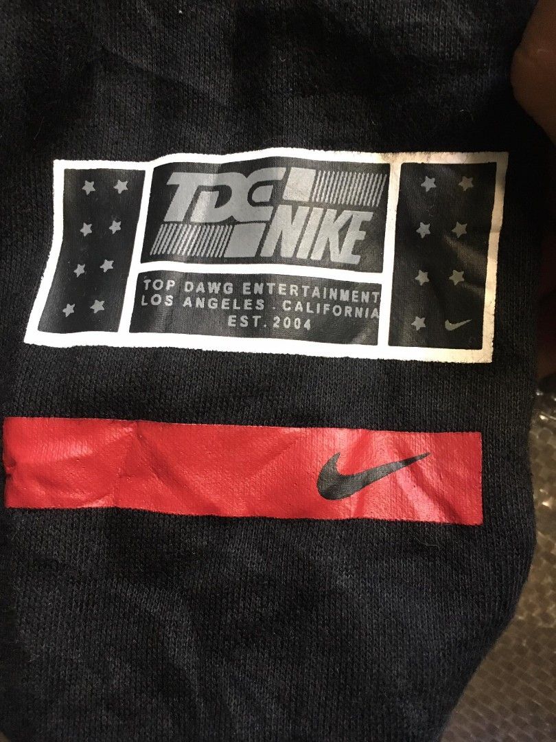 tde x nike crest logo