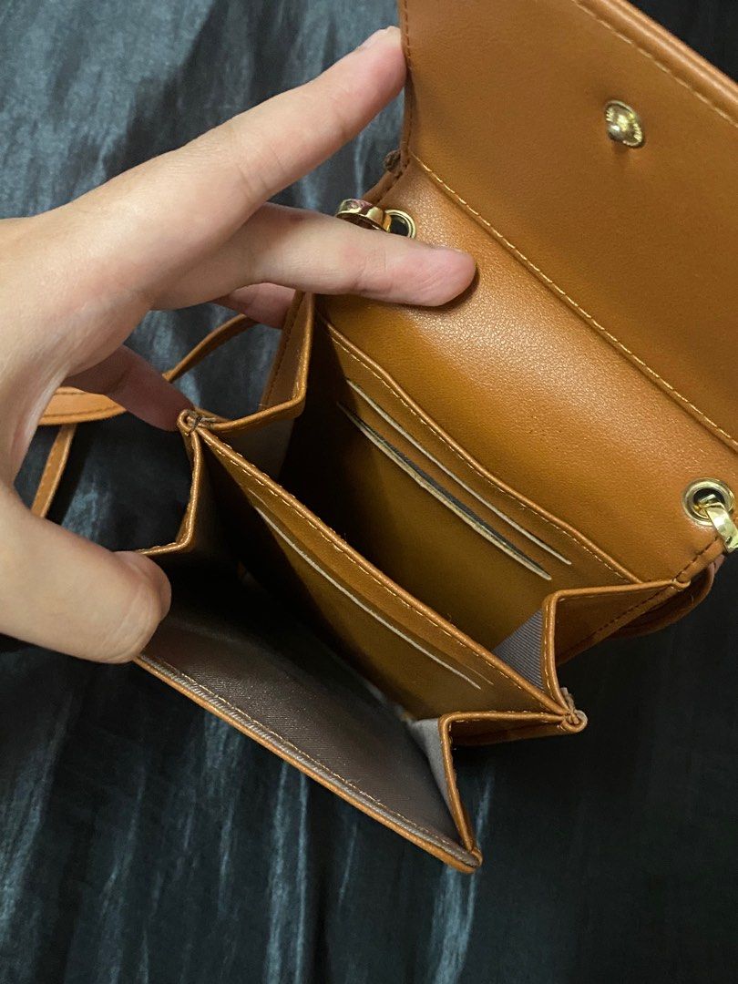 Purse with built in phone holder sales