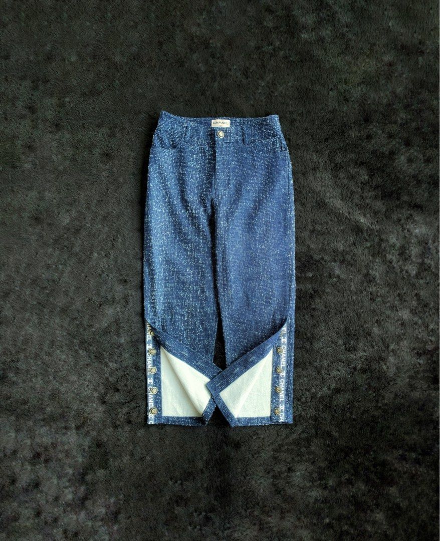 CHANEL - Blue With White Button Hem Tweed Pants (Category: Luxury Apparel) located in Dinalupihan. Submitted by thriftout.ph (Listing ID 1273832109, Image 2). Description: CHANEL - Blue With White Button Hem Tweed Pants SIZE - MEASUREMENTS: WAIST - 40 on tag • 28-30 waistline • 14.5 inches on tape measure LENGTH - 35.5 inches INSEAM - 23.5 inches LEG OPENING - 7 inches CONDITION - Excellent condition FLAWS - None OTHER DETAILS: •Cotton Materials 