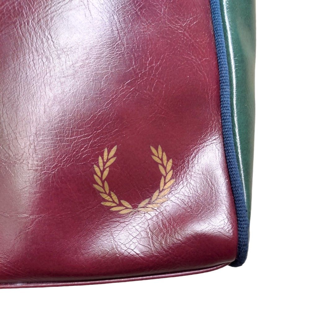 Fred perry - flight bag (Category: Sling Bags) located in Quezon City. Submitted by cyborgph (Listing ID 1273813969, Image 3). Description: fred perry flight bag in excellent to as new condition tricolor- blue briwn green no flaws large frame.