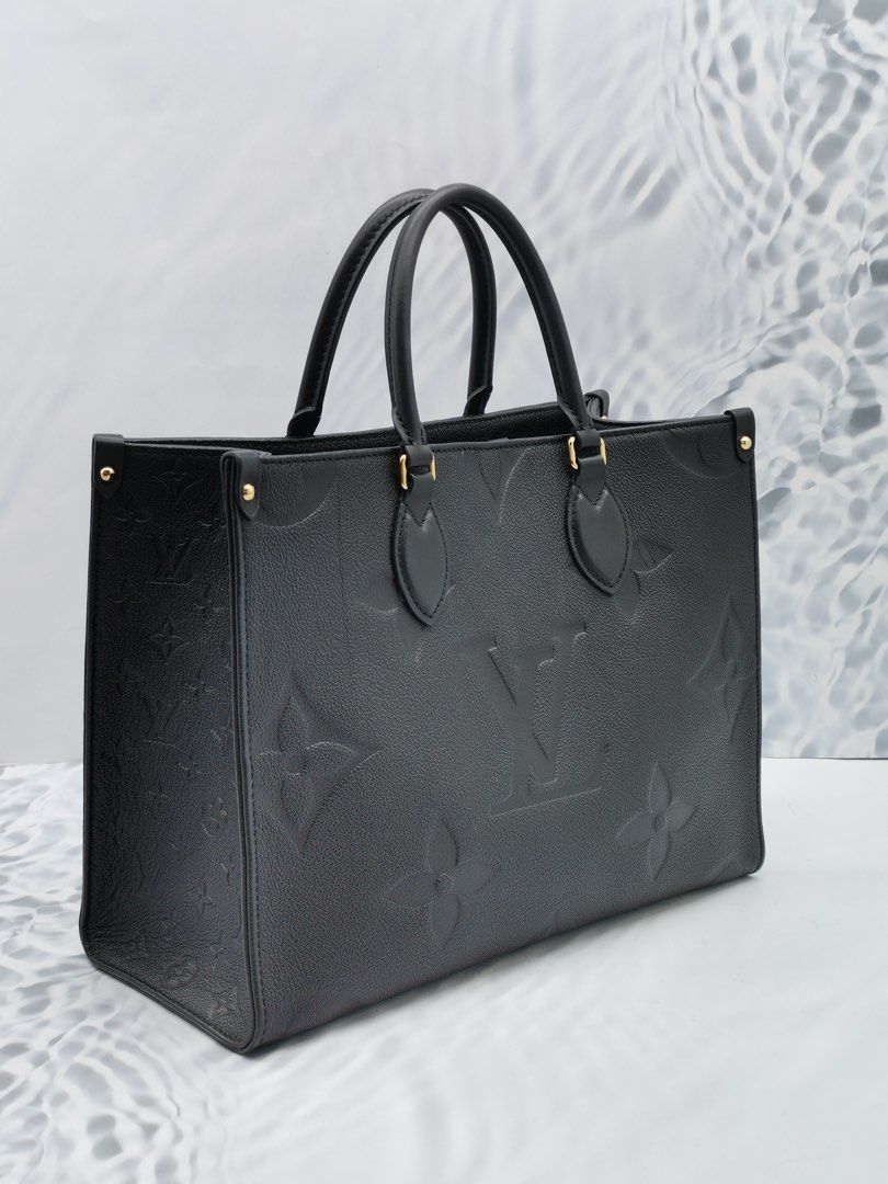 Louis vuitton black discount on the go tote