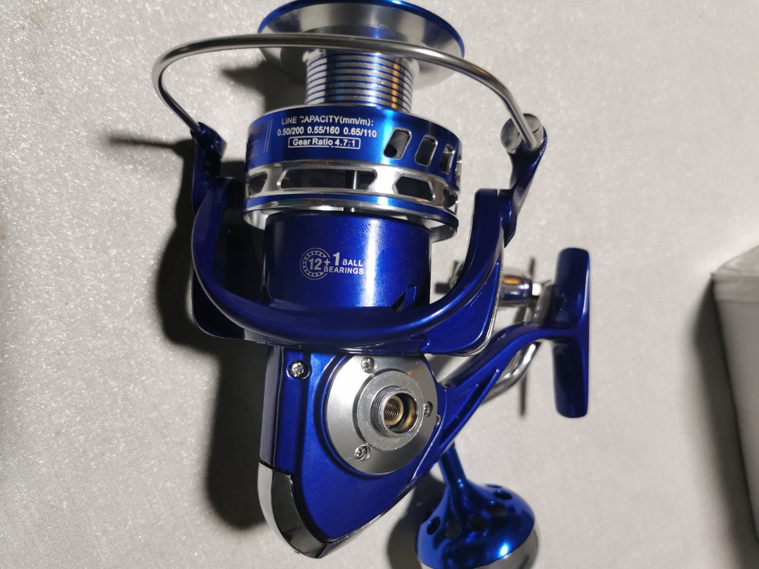 Reel Sking MX 7000, Sports Equipment, Fishing on Carousell