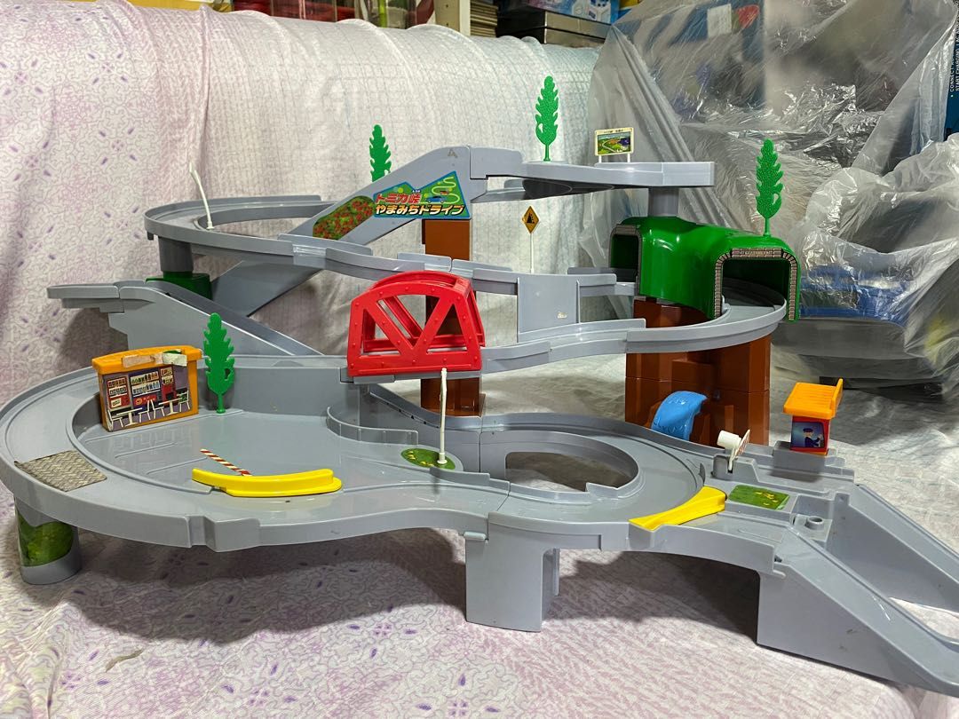 TAKARA Tomy Tomica Mountain Drive Set (Category: Vehicle & Diecast Models) located in Quezon City. Submitted by lr_eium (Listing ID 1273793448, Image 2). Description: TAKARA Tomy Tomica Mountain Drive Set Heavily used, since 10-12 years ago already. There are 2-3 missing trees and some of the stickers are placed badly..