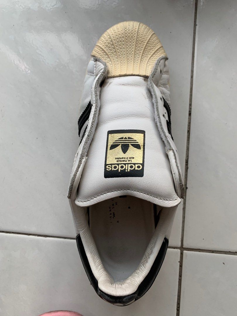 Superstar slip sales on mens silver