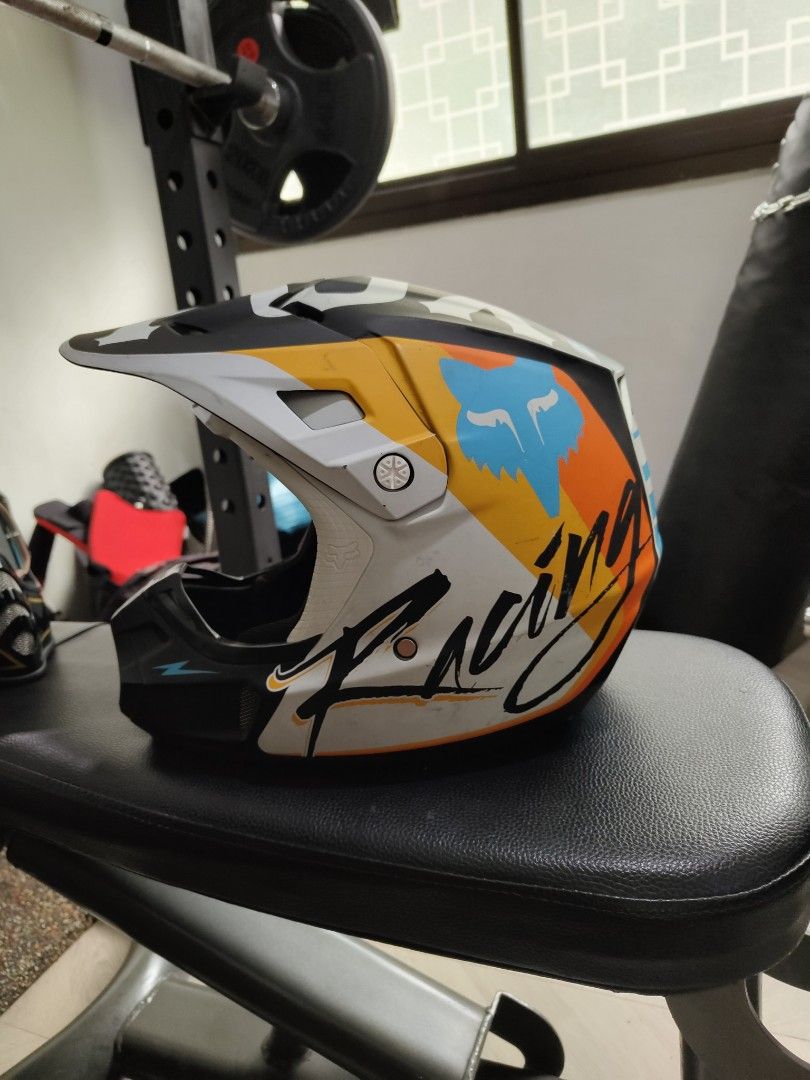 Fox Racing Adult V2 Motocross Helmet ROHR White Blue Orange LARGE (Category: Motorcycle Apparel) located in Singapore. Submitted by yoousnoozeyouloose (Listing ID 1273938465, Image 3). Description: Fox racing helmet. Very well maintained only use it for track. Use less than 20 times. Washed every time after use. Peak can be removed if one wish to use it on the streets. Slightly negotiable low ballers stay away or will be ignored..