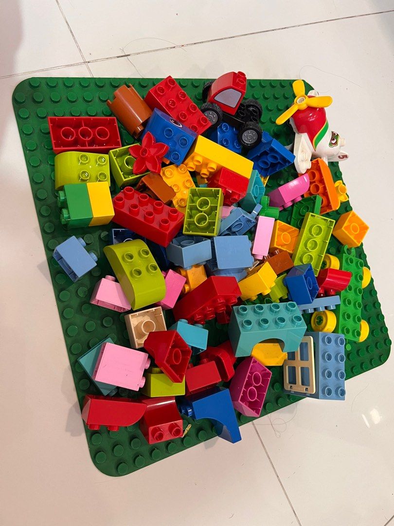 Lego Duplo for sale random pieces plus board good starter
