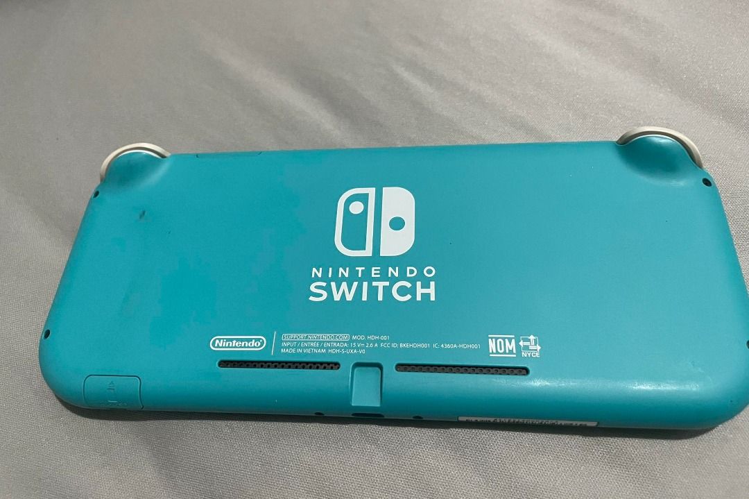 Nintendo Switch Lite (Turquoise) - with 64GB Micro SD and Cases - Lady ...