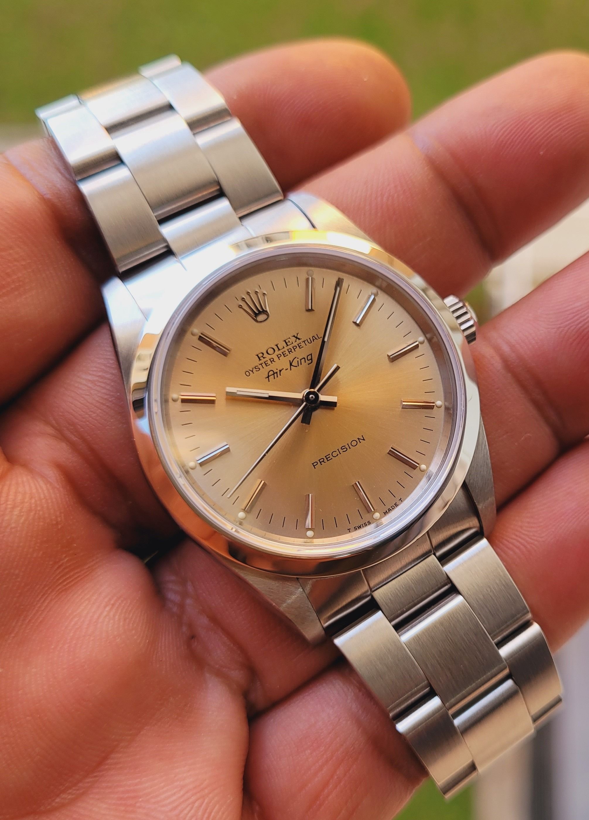 Rolex air best sale king champagne dial