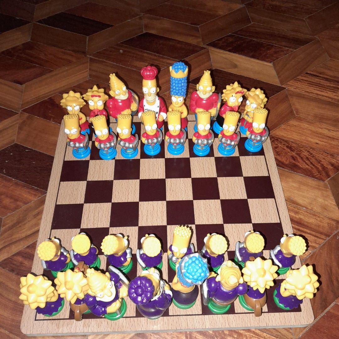 The Simpsons Chess set (Category: Board Games & Puzzles) located in Baguio. Submitted by shellcollector (Listing ID 1273986886, Image 2). Description: The Simpsons chess set complete pieces wood board 2nd hand Baguio loc shipping nationwide MOP Gcash Courier Flash Express 2800 Pesos.