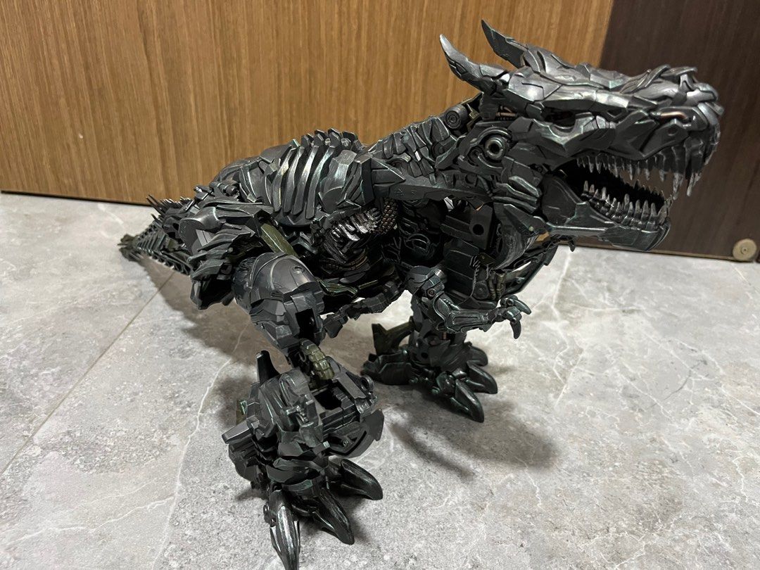 Transformers Grimlock (Category: Toy Figures) located in Singapore. Submitted by captainbowie (Listing ID 1274034751, Image 2). Description: Movie Bayverse AOE LOTK Grimlock oversized WJ. Big and heavy I have no space left. Self collect at void deck. .
