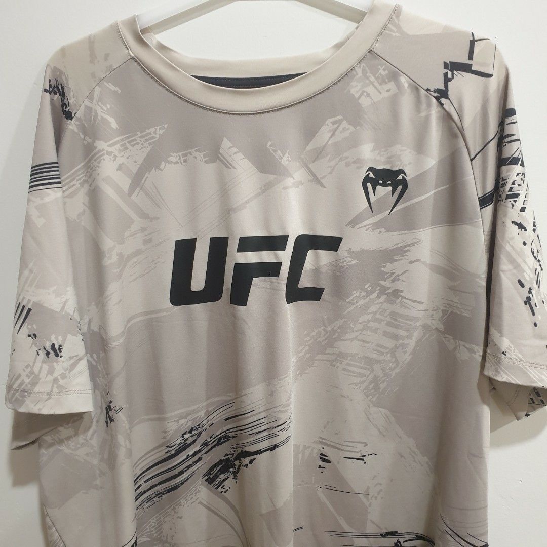 UFC Venum Authentic Fight Week 2.0 Men's Dry Tech T-shirt - Sand, Men's  Fashion, Activewear on Carousell