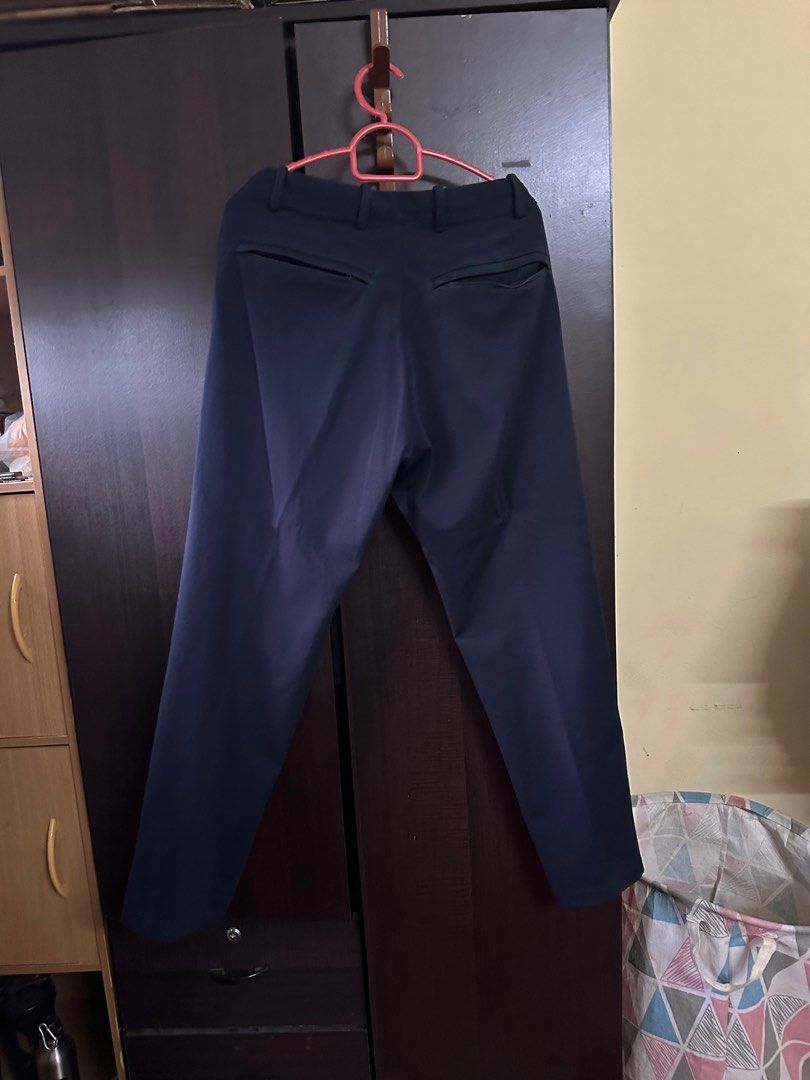 Uniqlo men smart ankle pant (ultra stretch) navy blue, Women's Fashion,  Bottoms, Other Bottoms on Carousell