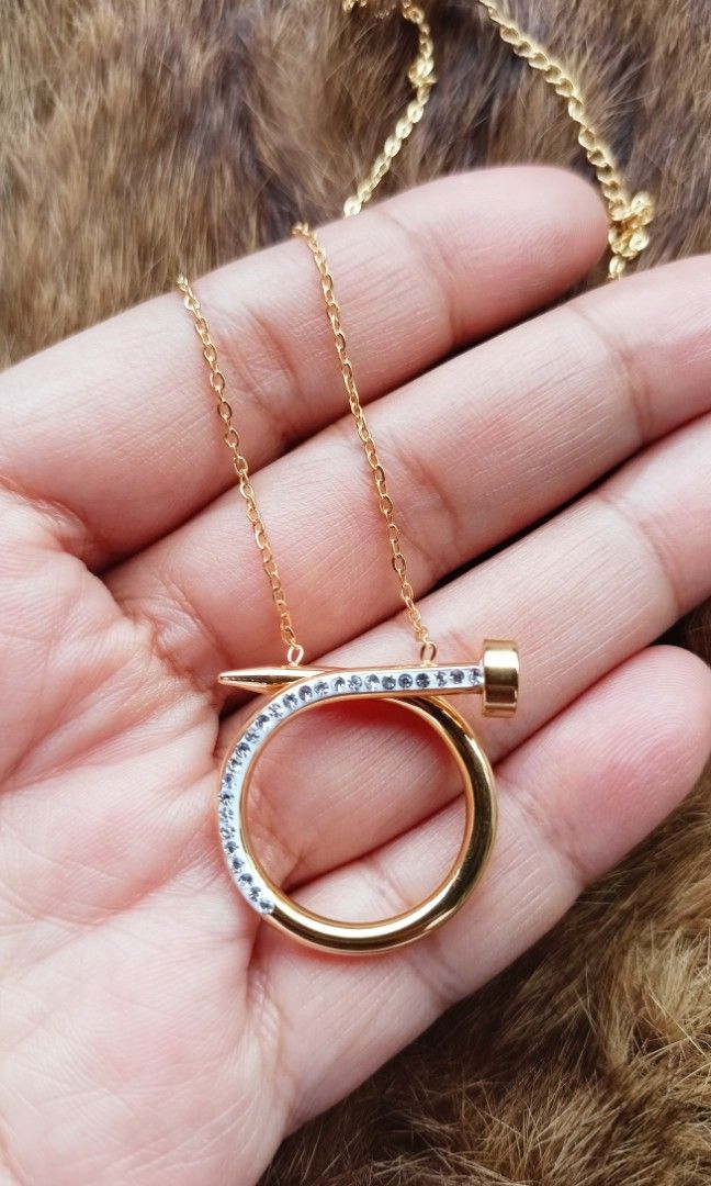 Cartier nail hotsell pendant