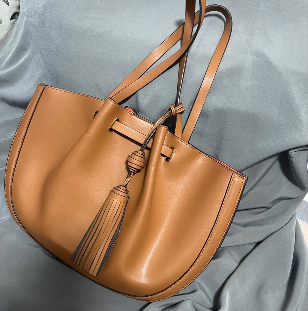 hand bag charles and keith tassel bag