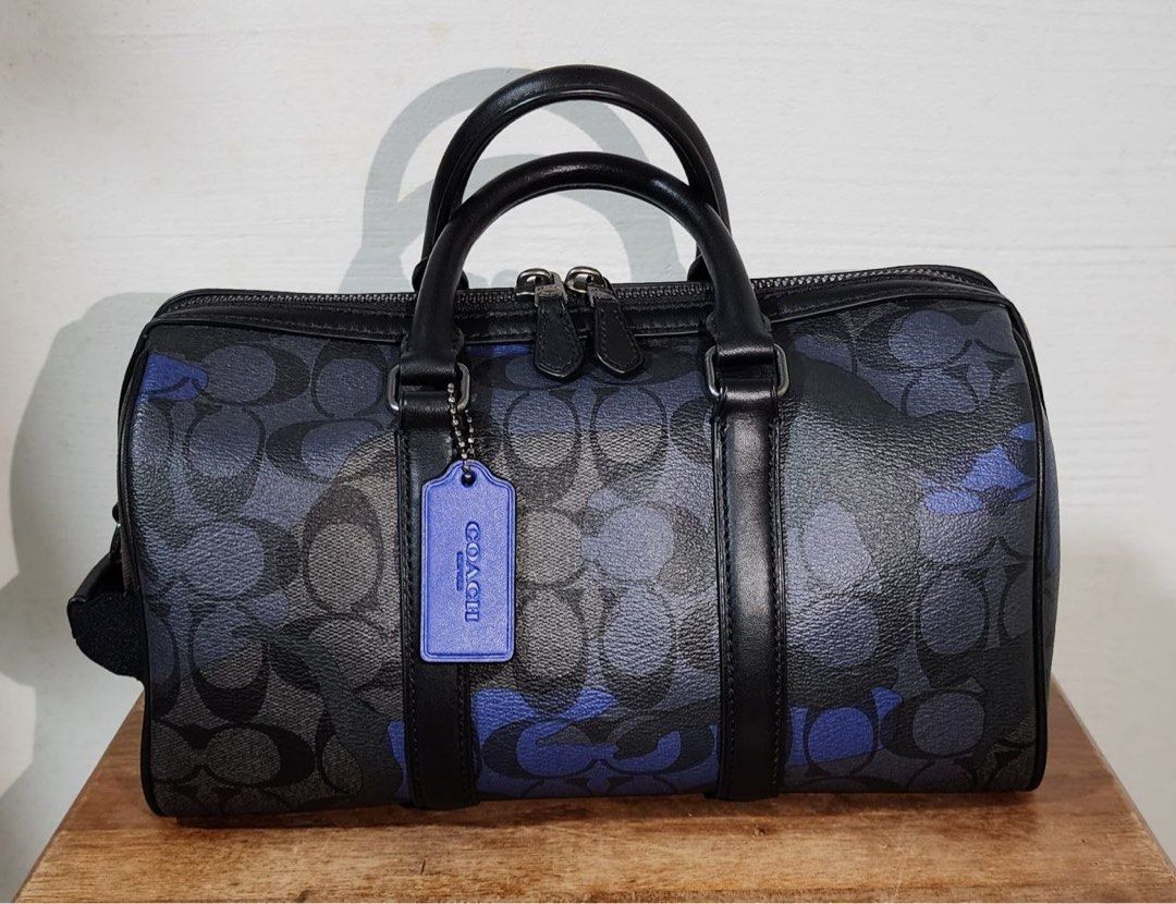 Coach camo duffle discount bag