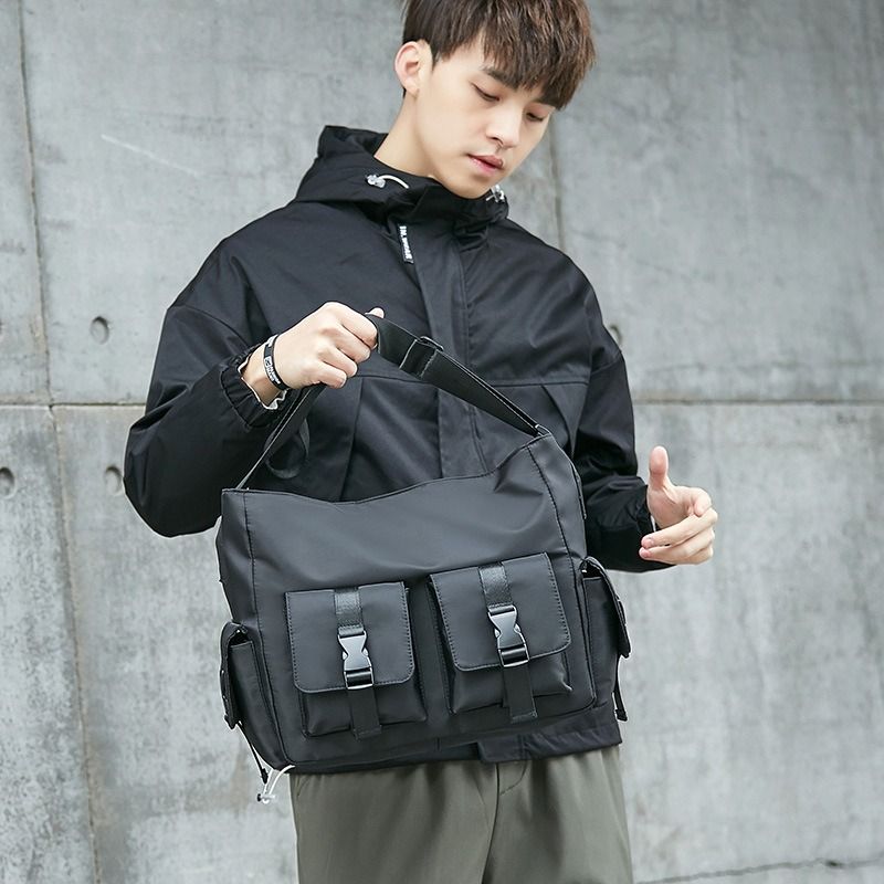 Crossbody bag men s trendy Japanese style workwear canvas student messenger bag ins backpack women s casual versatile shoulder bag Men s Fashion Bags Backpacks on Carousell