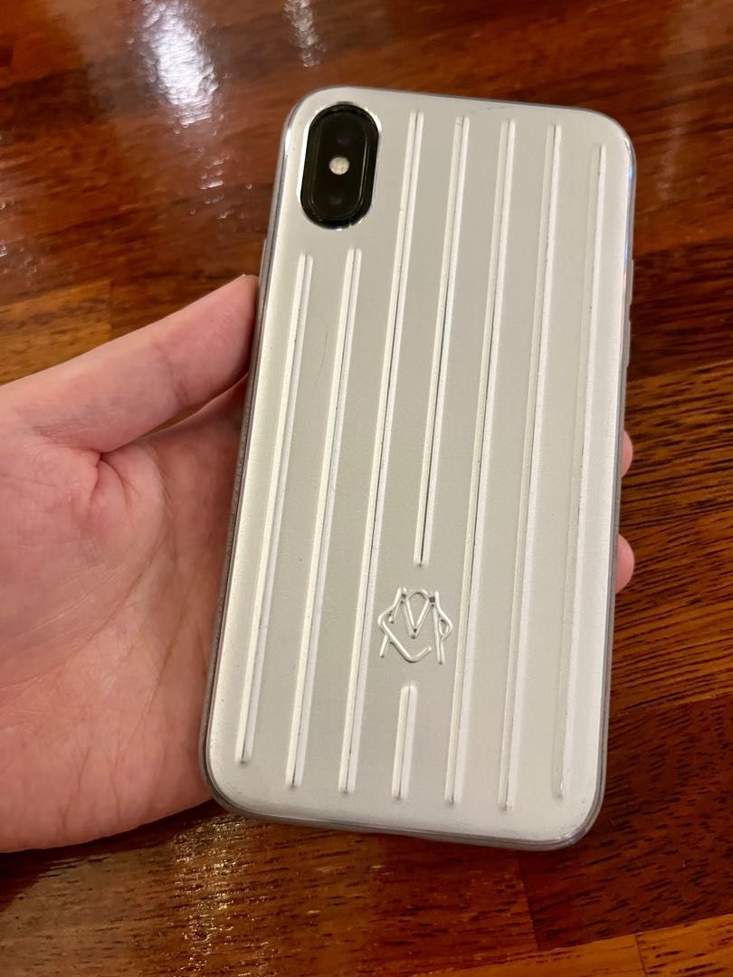 iPhone X 64gb with Original Rimowa Titanium Case Mobile Phones