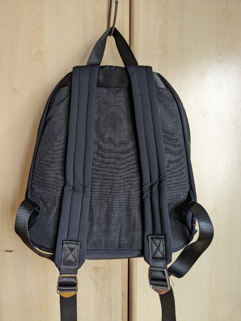 [Kipling] Backpack (Category: Backpacks) located in Singapore. Submitted by dilutedwater (Listing ID 1274166994, Image 2). Description: Kipling Backpack - Disney Snow White Colour: Black/Multi rainbow embroidery Measurements: 21.5cm L x 10.5cm W x 30cm H Handle strap: 2 shoulder straps, 1 handle Design: 1 main zipper compartment, 1 front zipper pocket Interior details: 1 zipper pocket, 2 side pockets, 2 pen slots Condition: 10/10 Meetups: Harbour