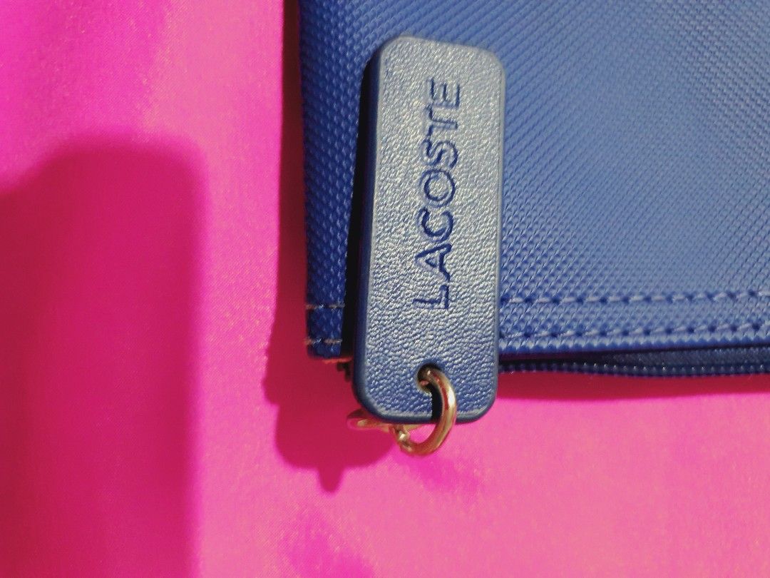 Original lacoste store bag vs fake