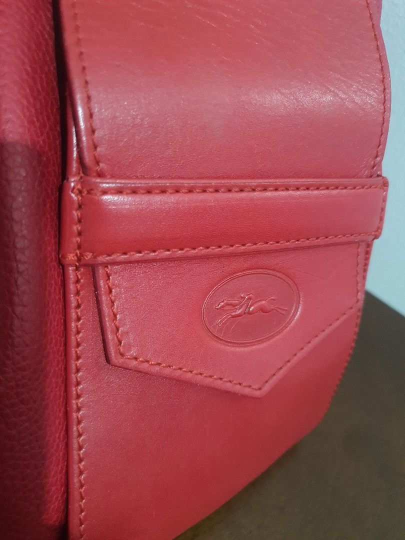 Longchamp Leather Vintage Drawstring Bag (Category: Luxury Bags & Wallets) located in Davao. Submitted by moodsale (Listing ID 1274261133, Image 3). Description: - Selling my well loved longchamp leather bag. - Minimal sign of usage - SF c/o buyer - Inquire for layaway plan :).