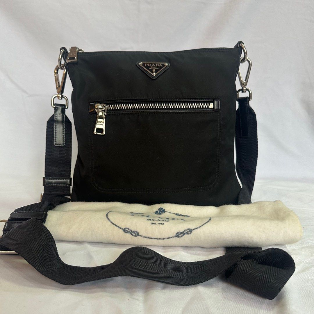 Prada Nylon Sling Crossbody Bag (Category: Luxury Bags & Wallets) located in Quezon City. Submitted by luxpalace (Listing ID 1274246721, Image 1). Description: 𝐏𝐑𝐀𝐃𝐀 𝐒𝐥𝐢𝐧𝐠 𝐁𝐚𝐠 ❕Rank A (excellent condition) ❕With dustbag, no flaws ❕Original.