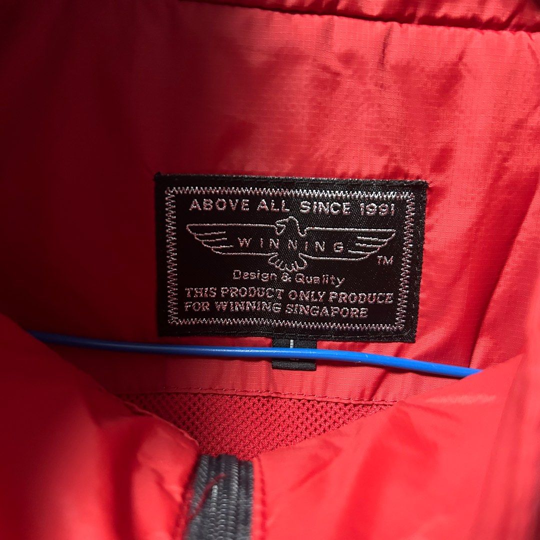 All red windbreaker 2025