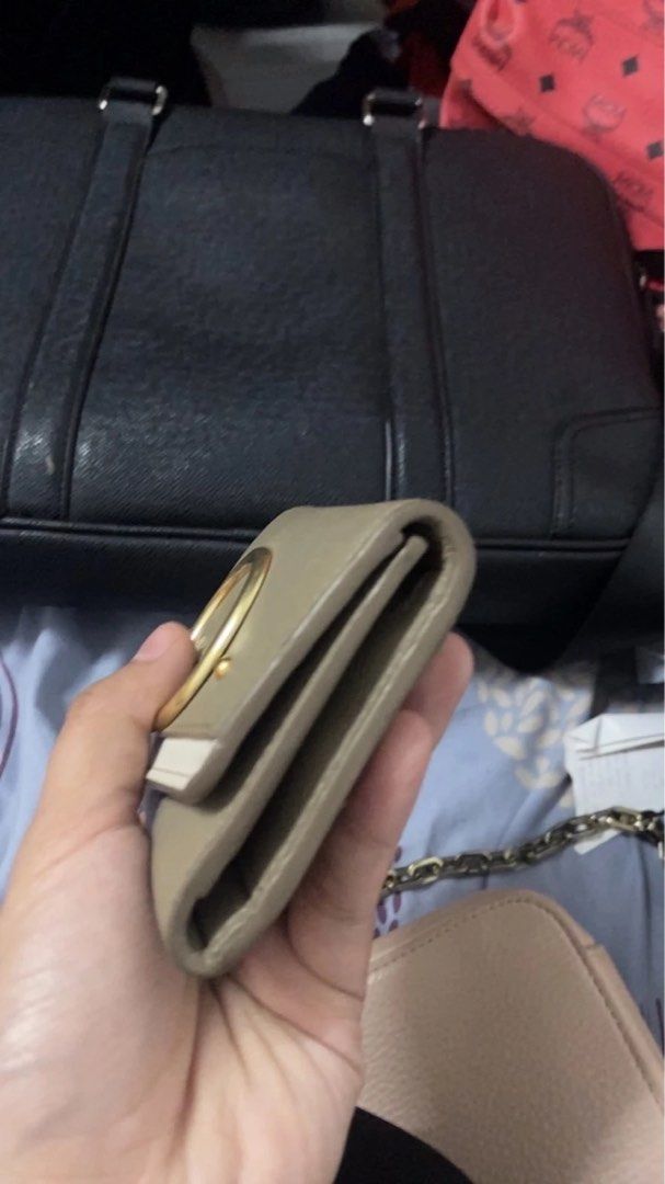 See by Chloe Wallet (Category: Luxury Bags & Wallets) located in Quezon City. Submitted by highhellocurator (Listing ID 1274371482, Image 3). Description: (NEGOTIABLE) This is a see by chloe wallet with qr code and serial code number -color taupe combination of white -gold hardware - with coin compartment and bills - good condition -very genuine leather tatagal ng 100 years.
