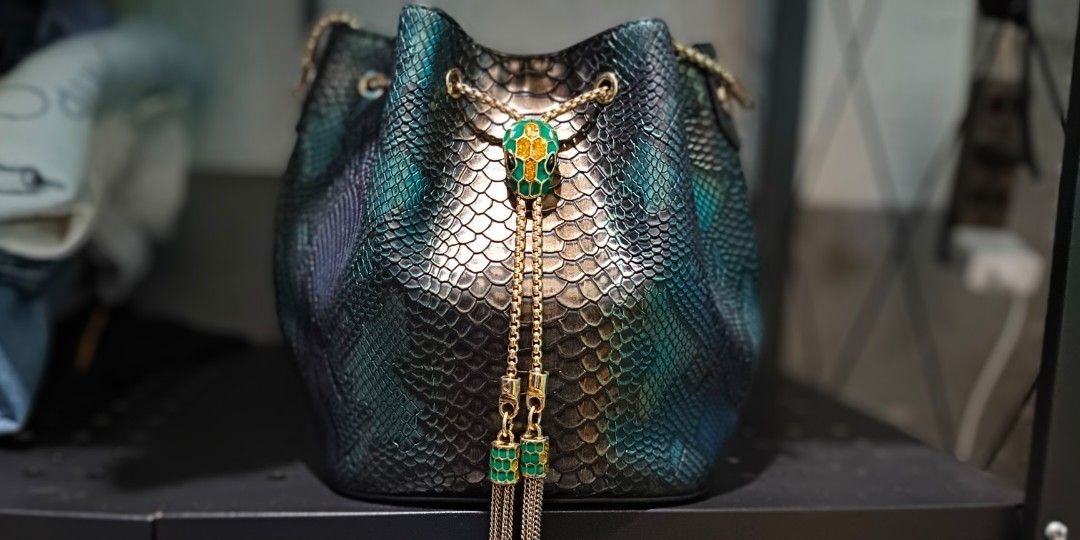 Snakeskin bucket bag sales
