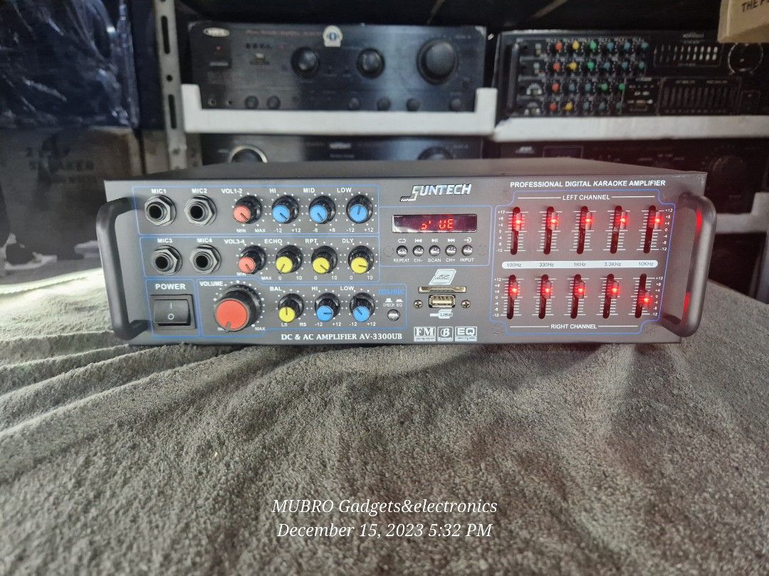 suntech amplifier Av-330uv (Category: Soundbars, Speakers & Amplifiers) located in Quezon City. Submitted by mubrogadgets (Listing ID 1274263836, Image 1). Description: 220v & 12v Karaoke Amplifier AV-3300UB 300 watts 2 channel bluetooth amplifier with Mixer Equalizer1.usb input2.bluetooth3. 300watts4.2 channel5. FM RADIO5. 4 mic input * BLUETOOTH AUDIO STREAMING * USB/SD MP3 AUDIO PLAYBACK * FM RADIO RECEIVE * AUDIO LINE INPUT/ OUTPUT * SOURCE B