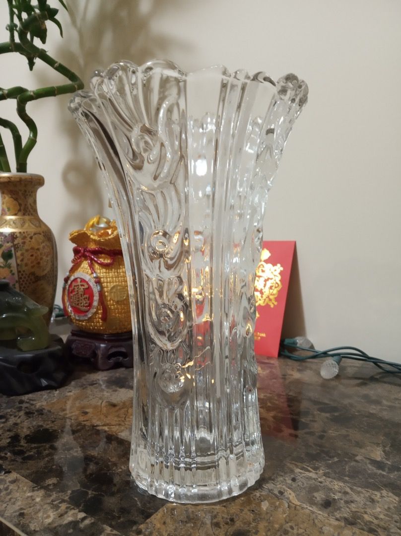 Table Flower Vase crystal glass 9.75" X 6" (Category: Craft Supplies & Tools) located in Edmonton. Submitted by lamdiamond (Listing ID 1274377906, Image 1). Description: Used (good condition, no damage) Hold real thing better than hold cash Vase is surrounded by flower which symbolize happiness and victory, you will like this vase both style and size, bring you nice mood every day. Both all sides and bottom of the vase is thicken design, compared