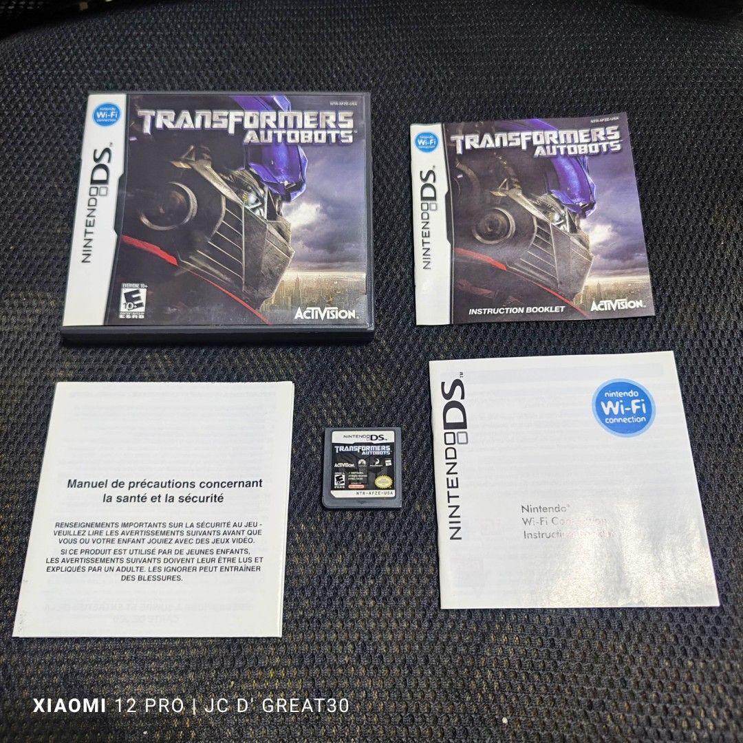 Transformers Autobot DS Game (Category: Nintendo) located in Quezon City. Submitted by shopme_gadget30 (Listing ID 1274297537, Image 1). Description: kindly read the details first for sale fixed price mint condition tested and working with Case and cart with Insert usa region qc area meet up: sm north shipping fee must shoulder by the buyer via lalamove or grab payment: bdo/gcash shoooppppppppeeeeee ⬇️ ⬇️ pm for the link happy gaming everyone.