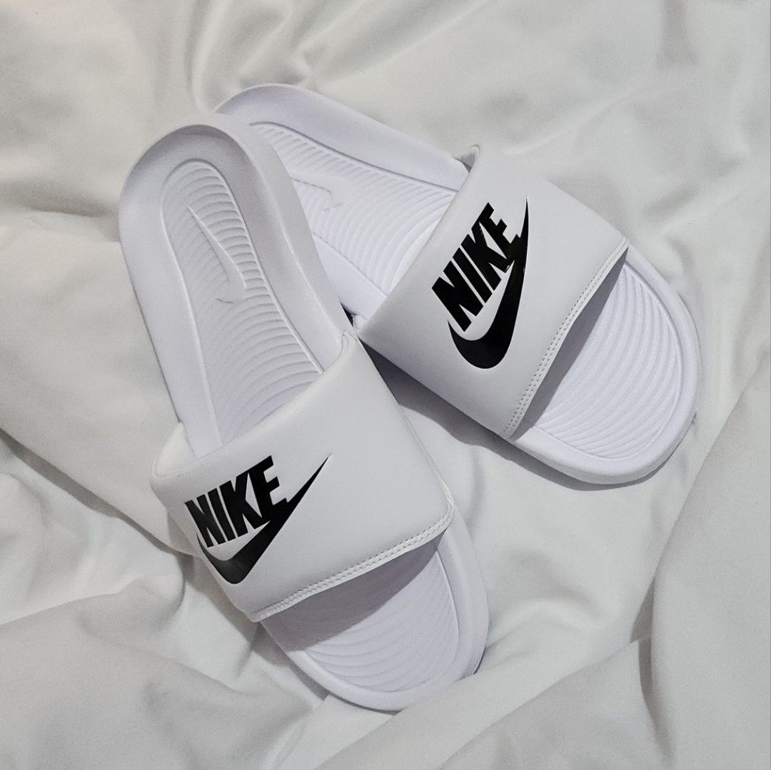 Buy nike slippers at 50 off 2025
