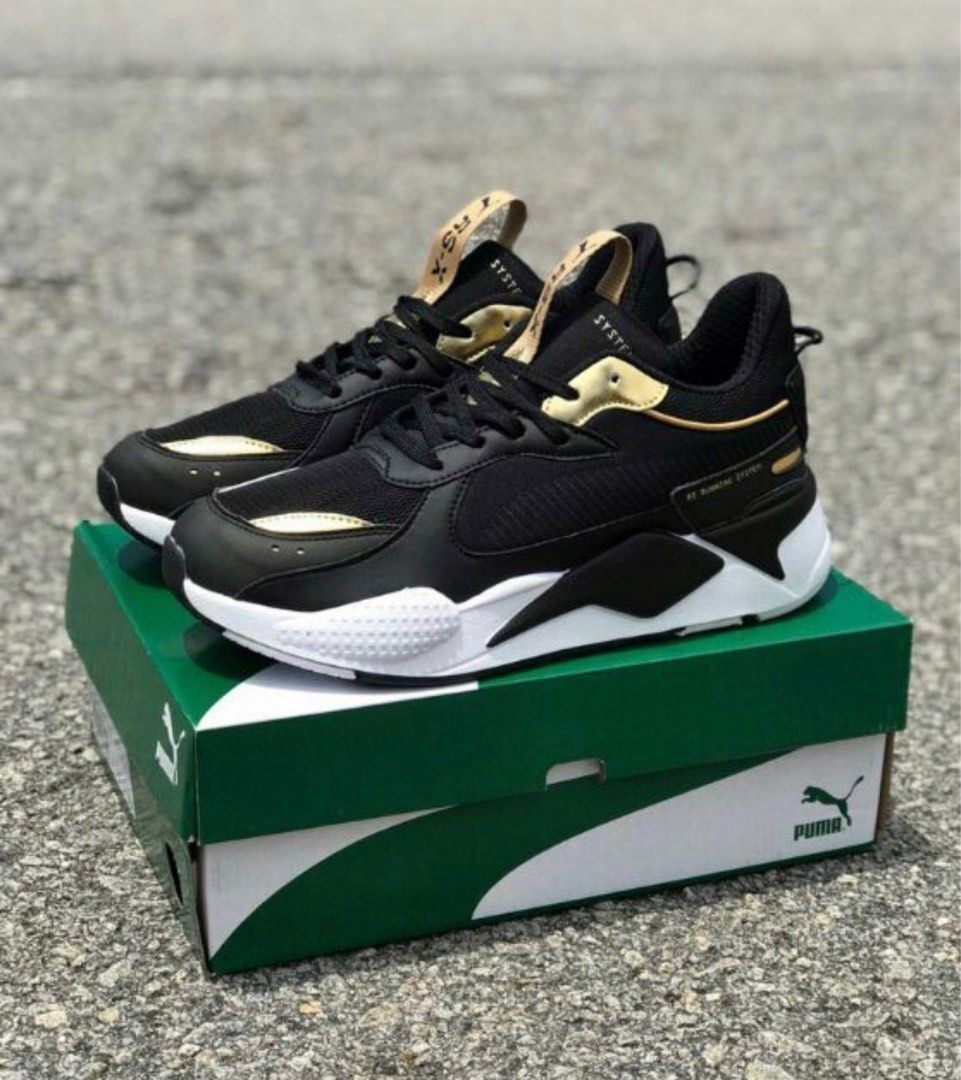 Puma rsx deals black and gold